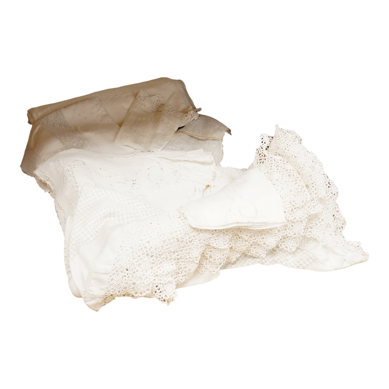 A collection of cutwork, needlework, filet, crochet and drawn thread worked table cloths etc